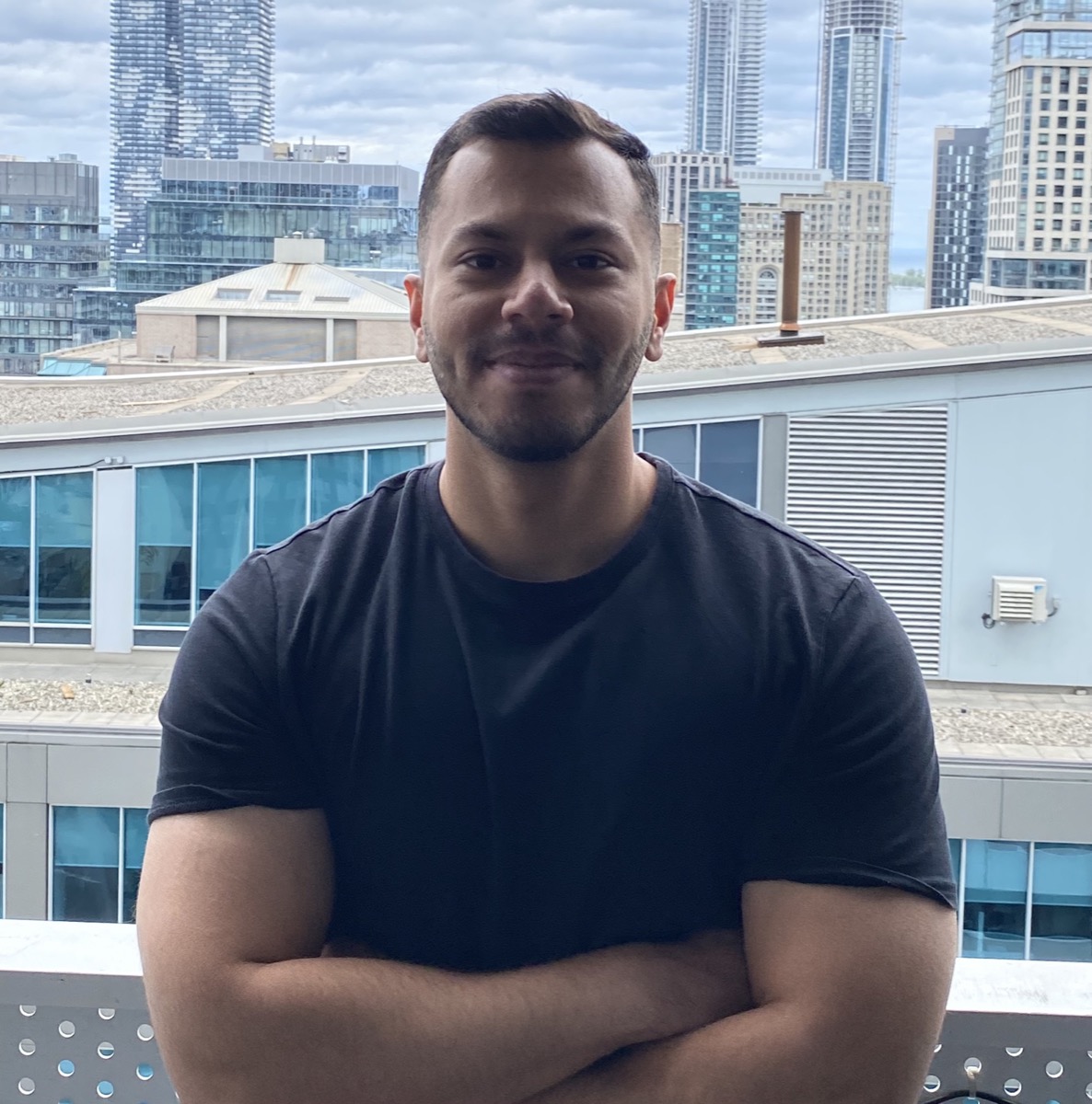 Raghav Kalra in front of the Toronto skyline